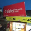 Photo showing an Airtel board atop a shop