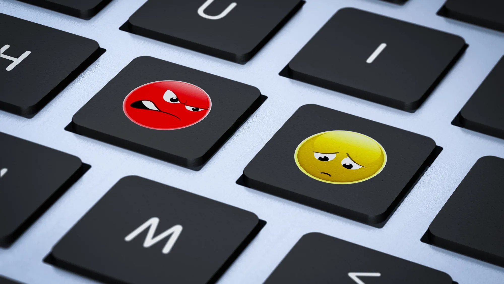social media angry sad emoji on keyboard